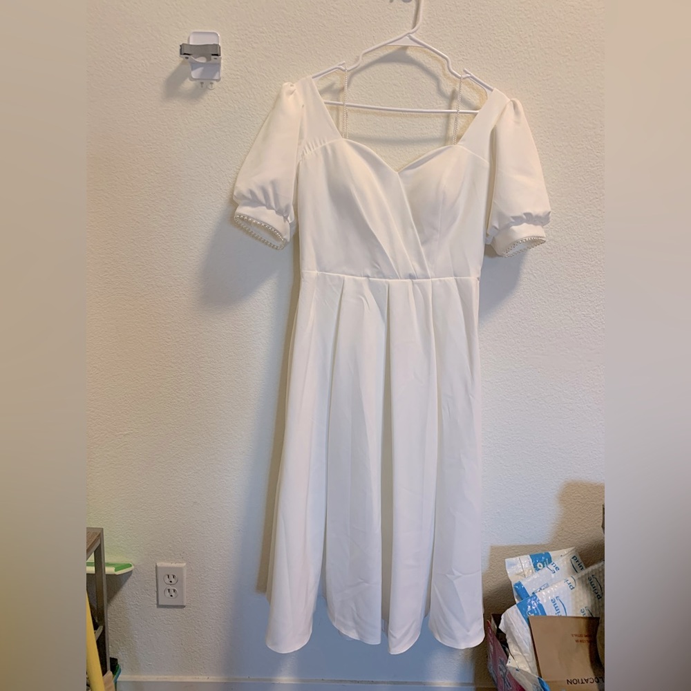 White off shoulder dress with pearl string and detached big bow tie